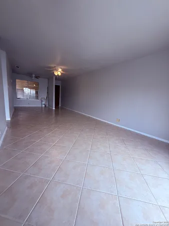 a view of a livingroom and a fireplace