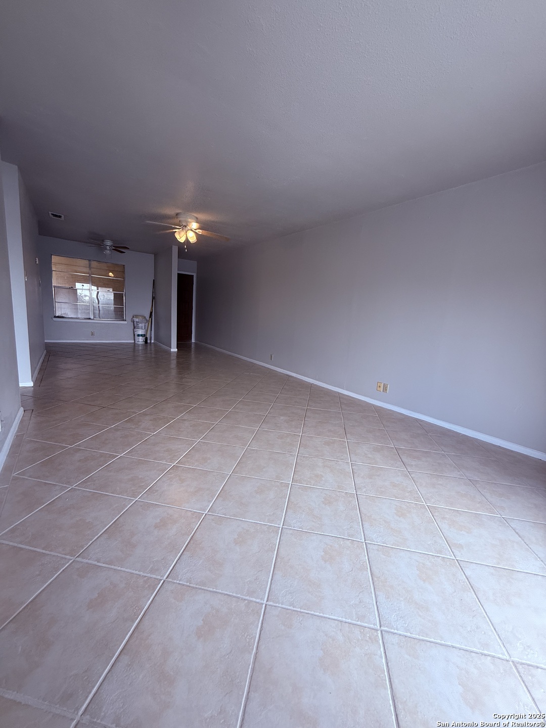 923 Vance Jackson Road, Unit 804 San Antonio, TX 78201 - Photo 3 of 10 a view of a livingroom and a fireplace