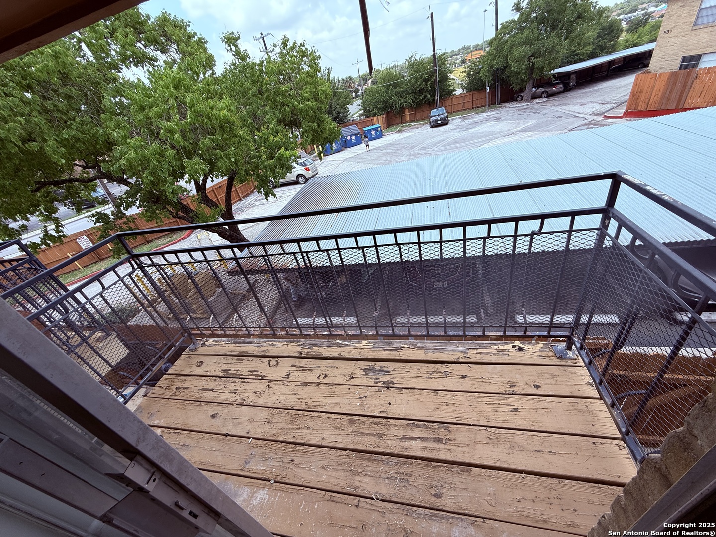923 Vance Jackson Road, Unit 804 San Antonio, TX 78201 - Photo 9 of 10 a view of balcony with wooden floor