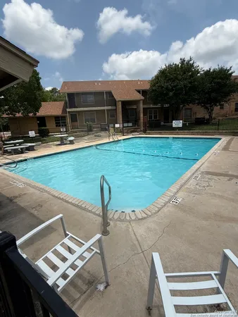 a view of a patio with a yard