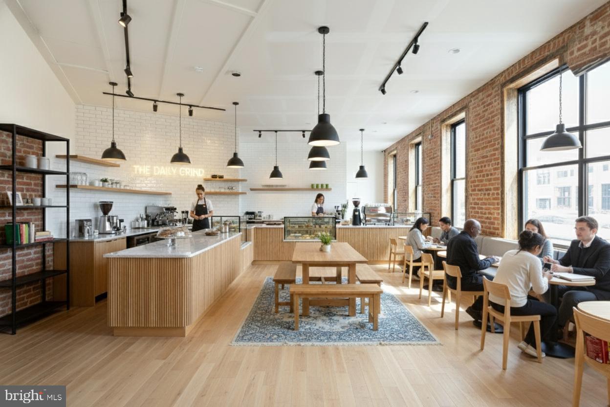 2324 North Capitol Street Northwest Washington, DC 20002 - Photo 11 of 35 a large kitchen with lots of counter space and windows