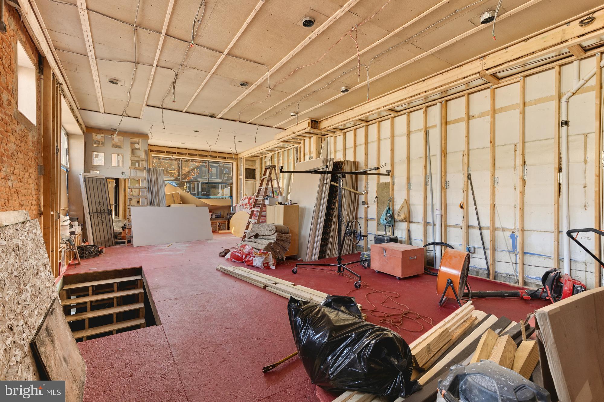 2324 North Capitol Street Northwest Washington, DC 20002 - Photo 12 of 35 a bedroom with furniture and a large window