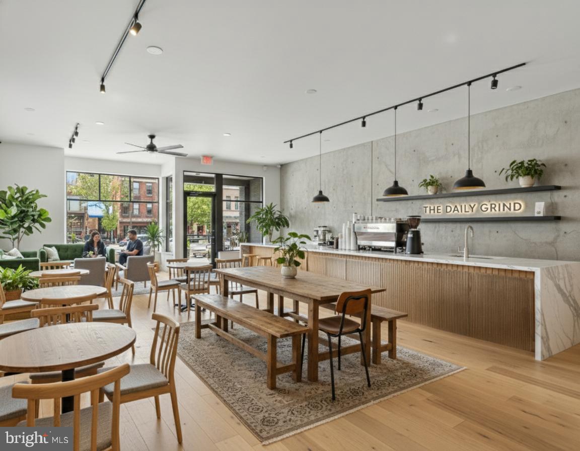 2324 North Capitol Street Northwest Washington, DC 20002 - Photo 13 of 35 a dining hall with stainless steel appliances granite countertop a dining table and chairs