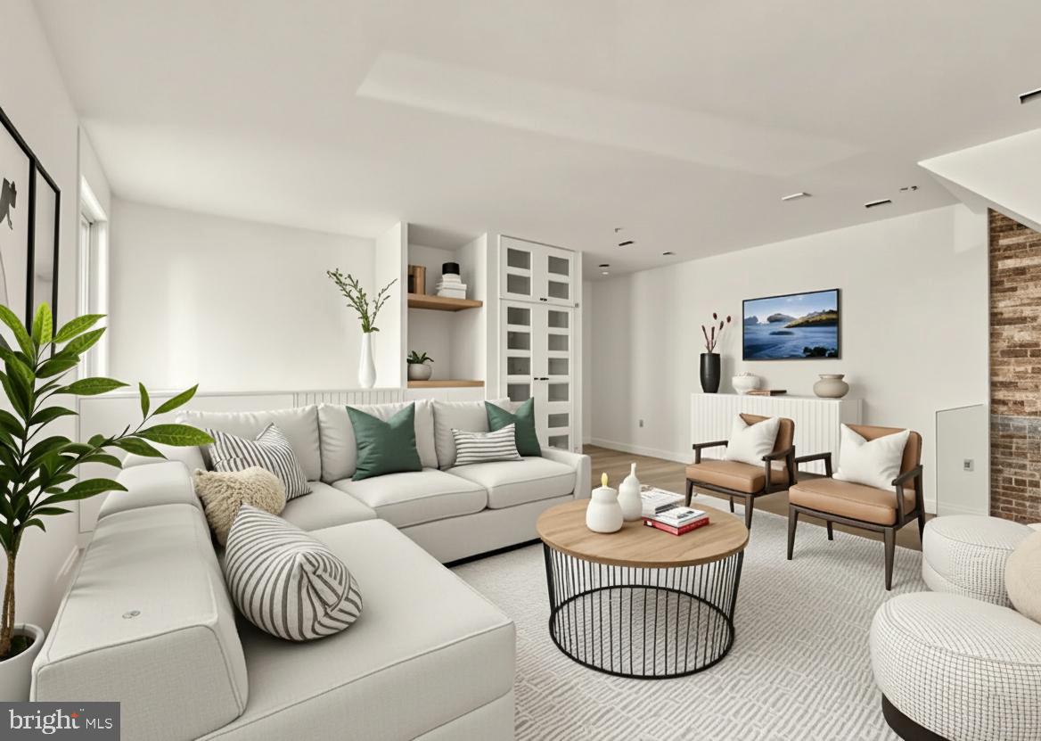 2324 North Capitol Street Northwest Washington, DC 20002 - Photo 20 of 35 a living room with furniture and a flat screen tv