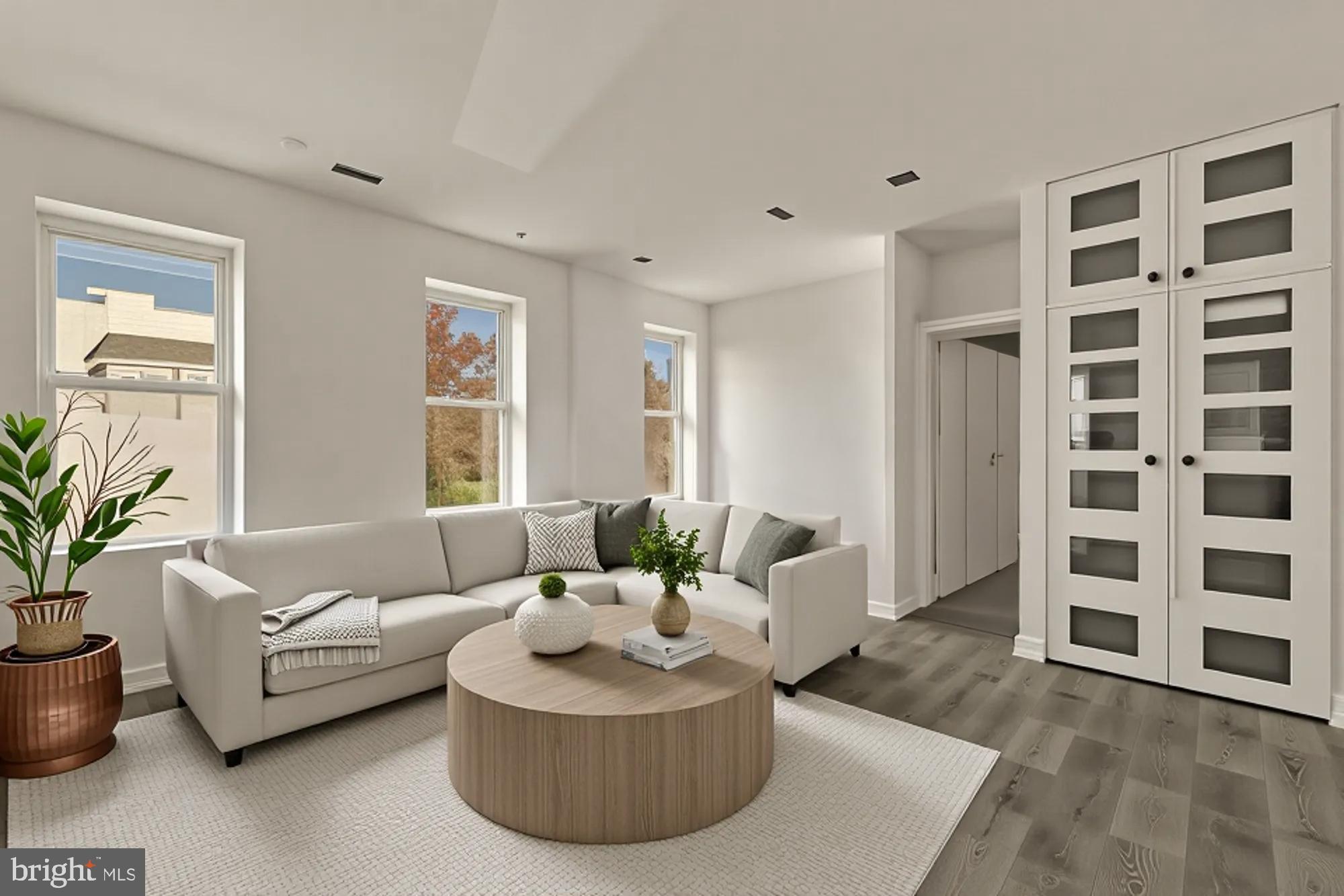 2324 North Capitol Street Northwest Washington, DC 20002 - Photo 22 of 35 a living room with furniture and a potted plant