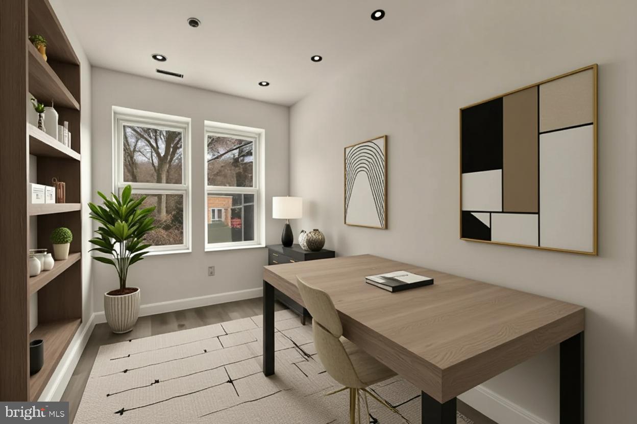 2324 North Capitol Street Northwest Washington, DC 20002 - Photo 28 of 35 a bathroom with a sink a large mirror and a bathtub