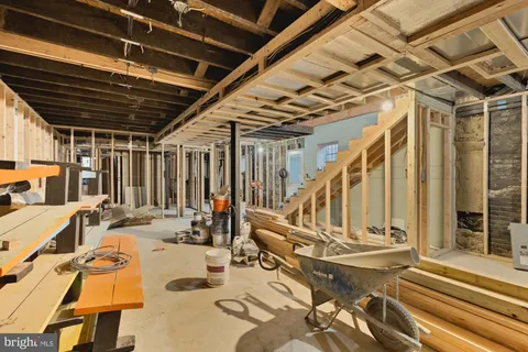 a view of a patio with table and chairs
