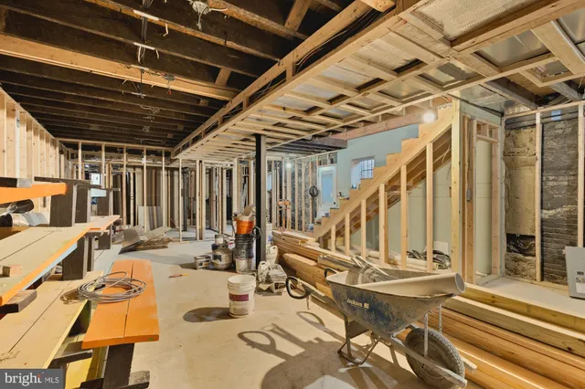 a view of a patio with table and chairs