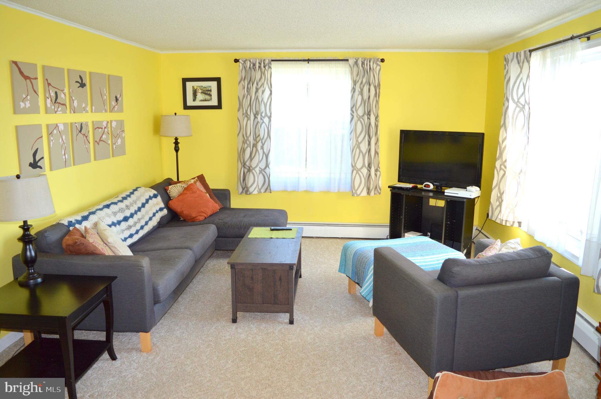 4666 Maiden Forest Road Rhodesdale, MD 21659 - Photo 3 of 17 a living room with furniture and a flat screen tv