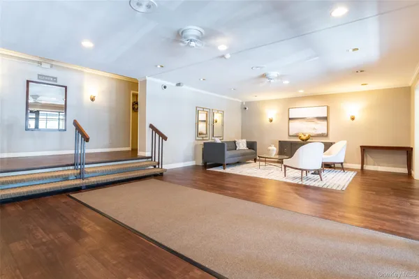 a living room with furniture and a table