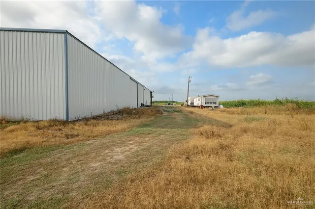 a view of a lake with a big yard