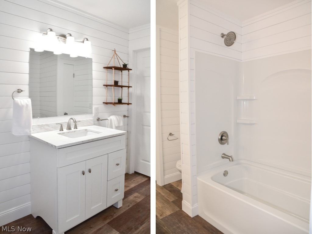 3754 Boydell Road Kent, OH 44240 - Photo 16 of 23 Remodeled full bath with a new vanity and shiplap accents.