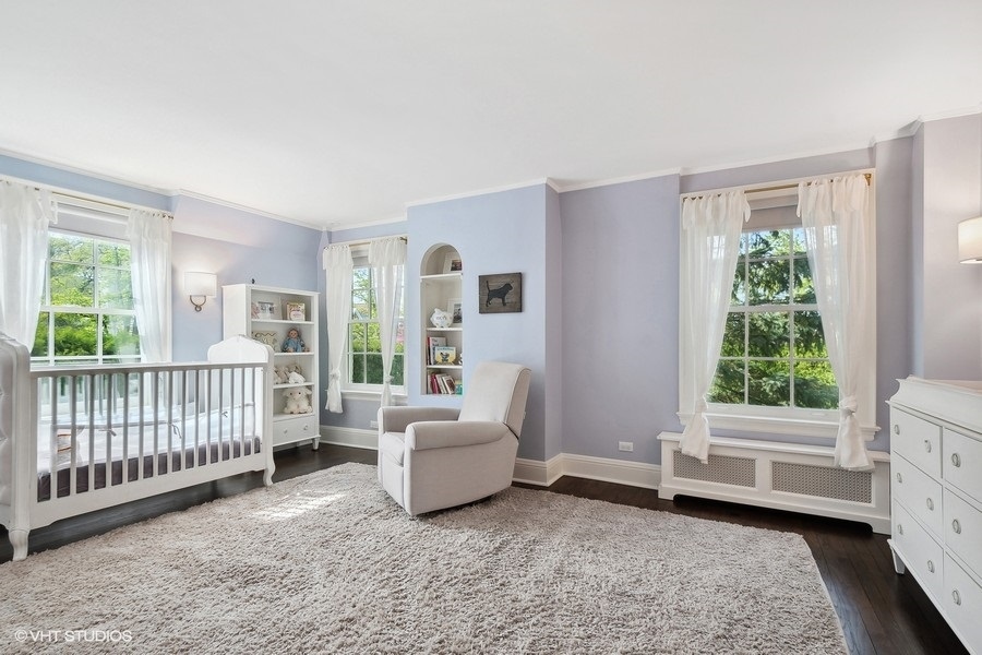 626 Warwick Road Kenilworth, IL 60043 - Photo 29 of 56 a bedroom with furniture and a window