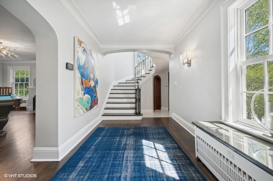 626 Warwick Road Kenilworth, IL 60043 - Photo 5 of 56 a view of an entryway with wooden floor
