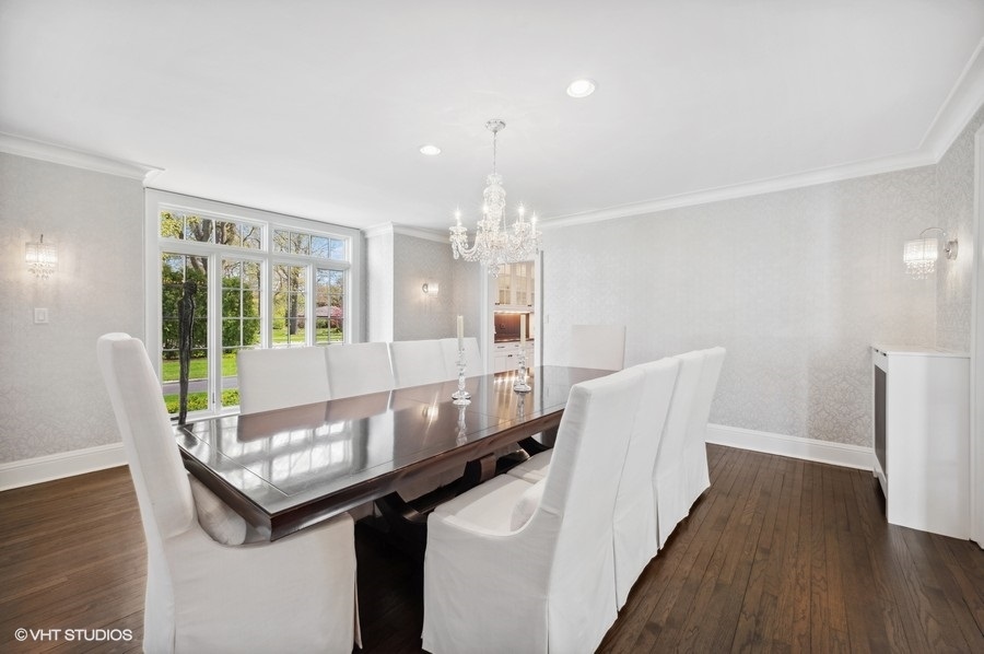 626 Warwick Road Kenilworth, IL 60043 - Photo 8 of 56 a dining room with furniture and wooden floor