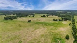 a view of a lake with a city
