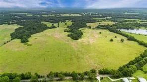 a view of a lake with a city