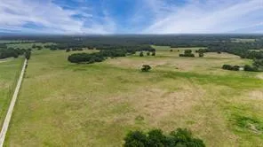 a view of lake with green space
