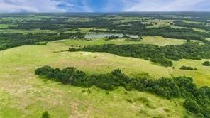 a view of a lake with a city