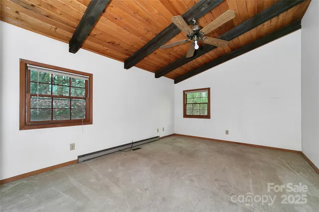 a view of a livingroom with wooden floor