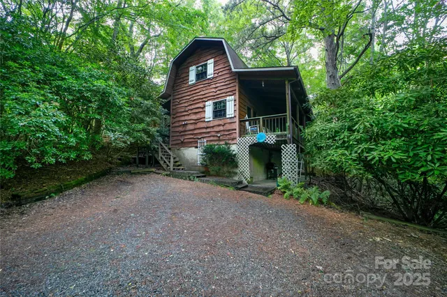 a view of balcony with wooden floor