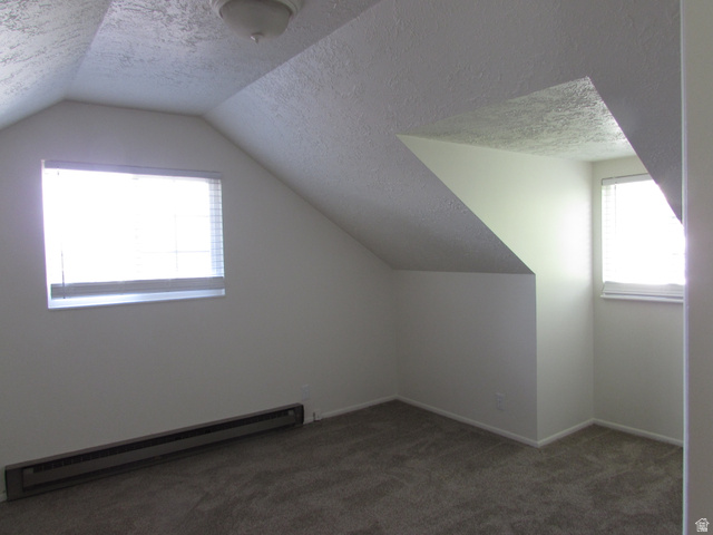 3166 Linden Street Bountiful, UT 84010 - Photo 20 of 25 Bedroom with baseboard heating and carpet