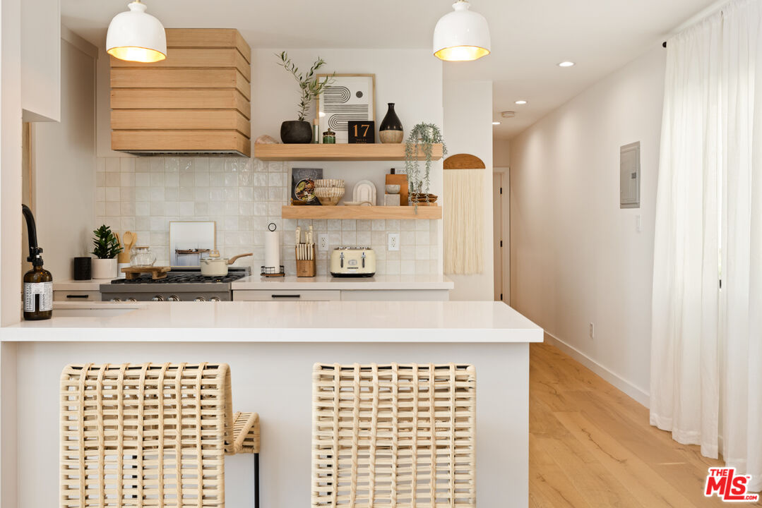 17 Sunset Avenue, Unit 1 Venice, CA 90291 - Photo 13 of 30 a kitchen with cabinets and window