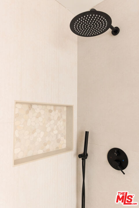 17 Sunset Avenue, Unit 1 Venice, CA 90291 - Photo 17 of 30 a bathroom with a shower and a window