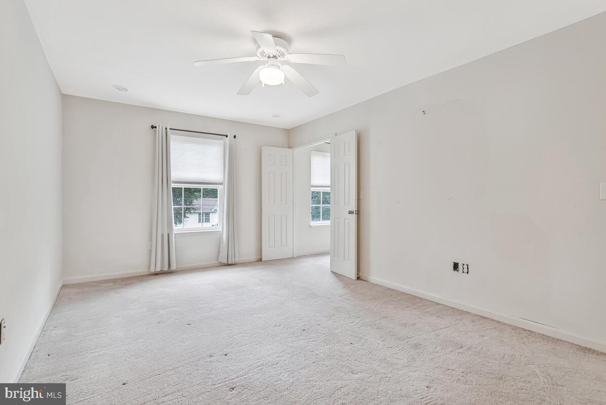11423 Rawhide Road Lusby, MD 20657 - Photo 20 of 37 a view of an empty room with a window