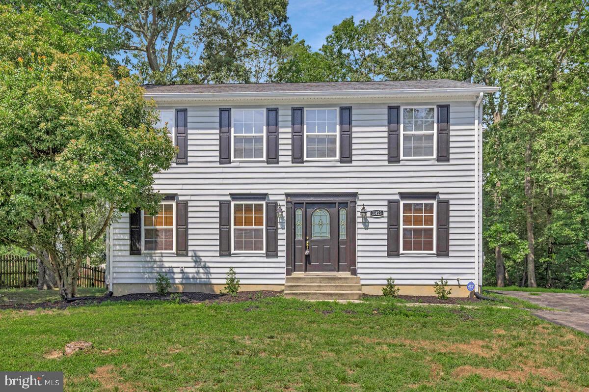 11423 Rawhide Road Lusby, MD 20657 - Photo 2 of 37 a house that has a big yard