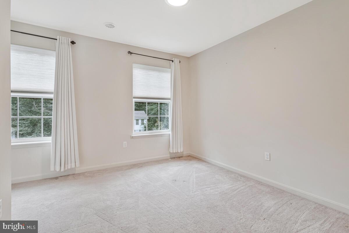11423 Rawhide Road Lusby, MD 20657 - Photo 22 of 37 an empty room with windows