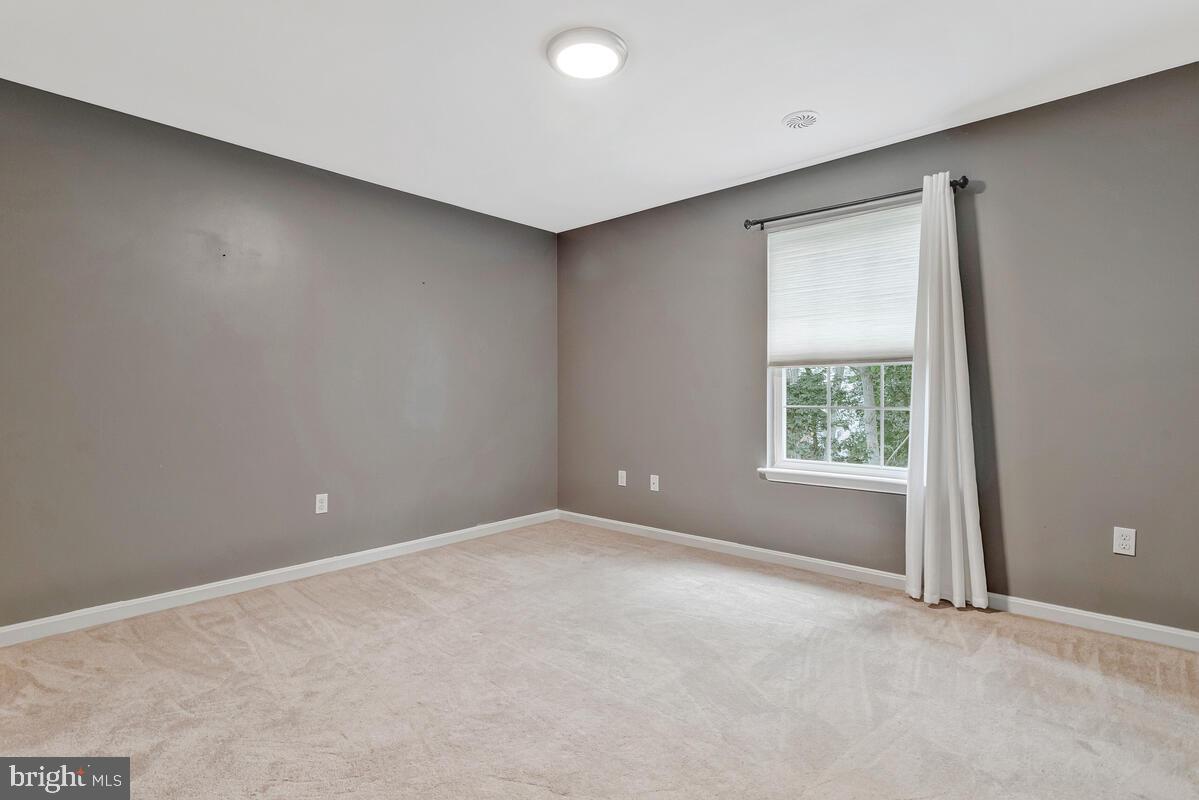 11423 Rawhide Road Lusby, MD 20657 - Photo 28 of 37 an empty room with a window