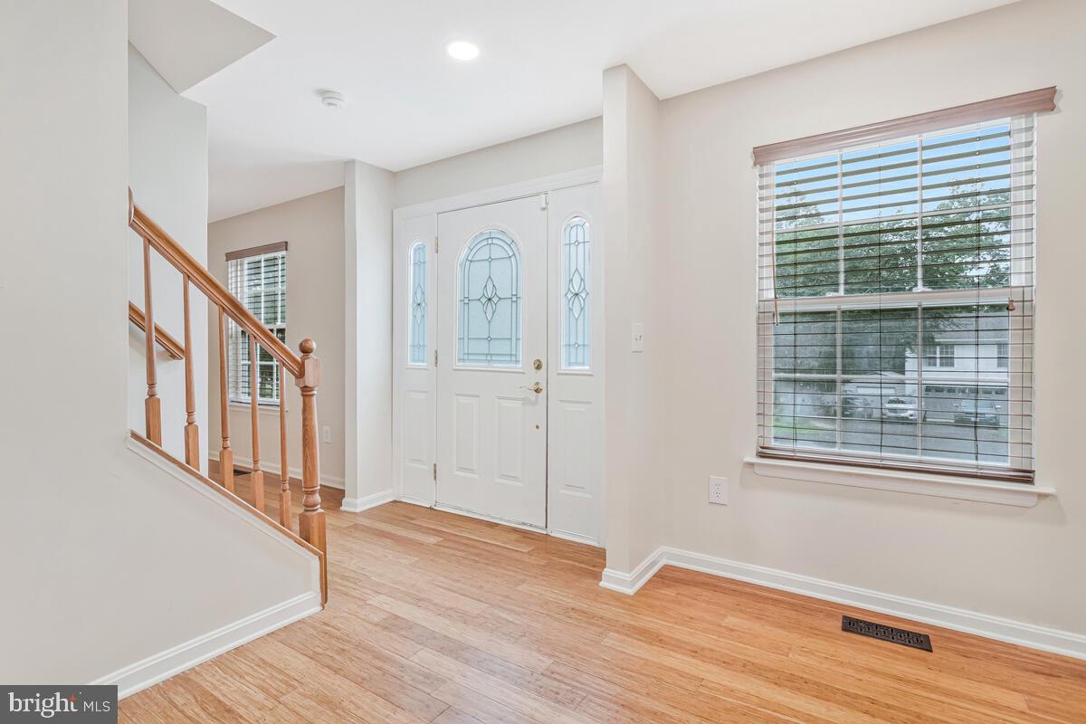 11423 Rawhide Road Lusby, MD 20657 - Photo 3 of 37 a view of an entryway with wooden floor and windows