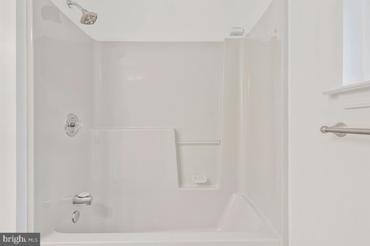 11423 Rawhide Road Lusby, MD 20657 - Photo 31 of 37 a bathroom with a shower