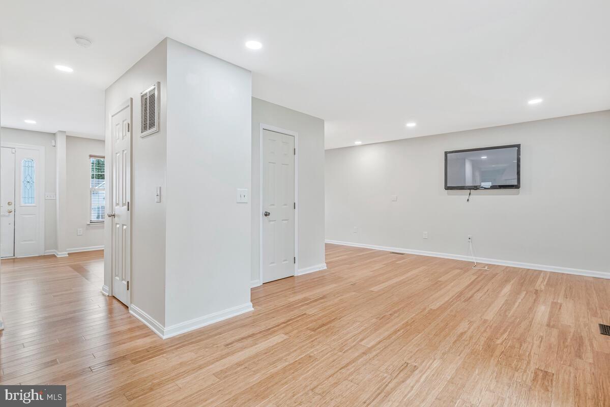 11423 Rawhide Road Lusby, MD 20657 - Photo 10 of 37 a view of empty room with wooden floor