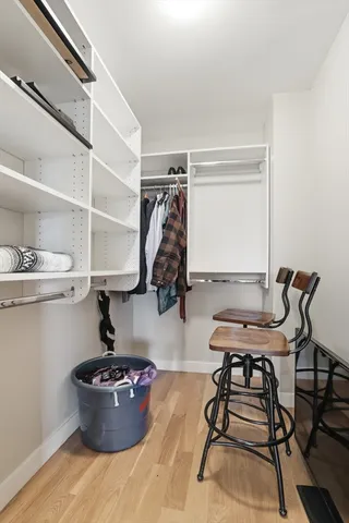 a room with a table and chairs