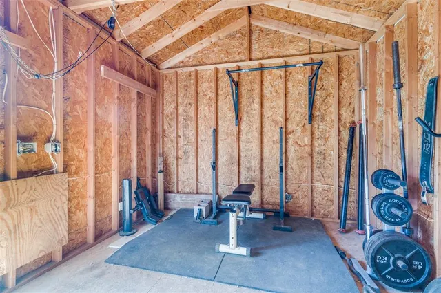 a view of front door with furniture and a window