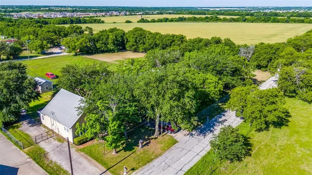 a view of a garden with an outdoor space