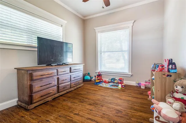 a room with furniture and flat screen tv