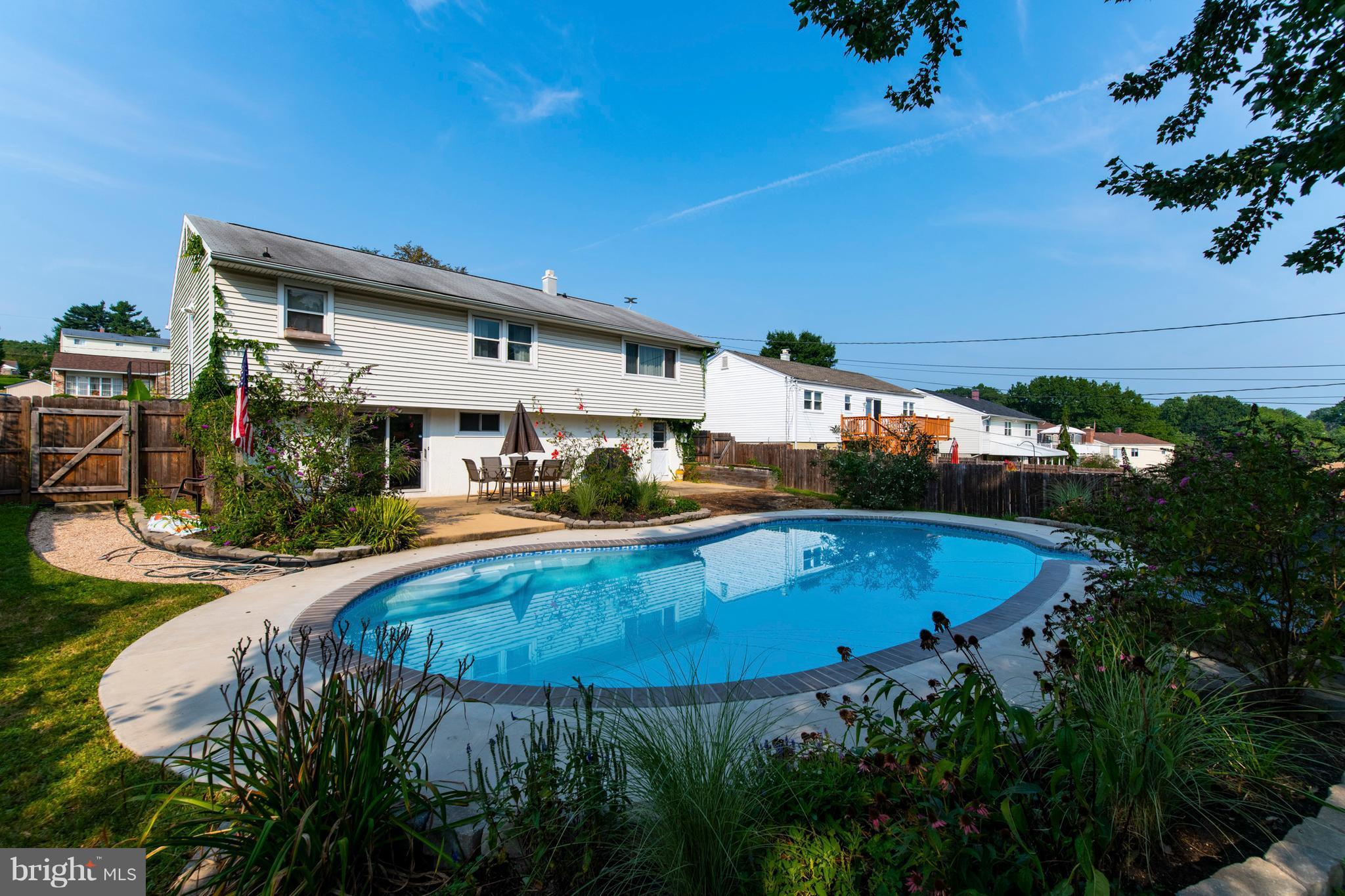 1519 National Road Baltimore, MD 21237 - Photo 24 of 30 an outdoor space with swimming pool and furniture