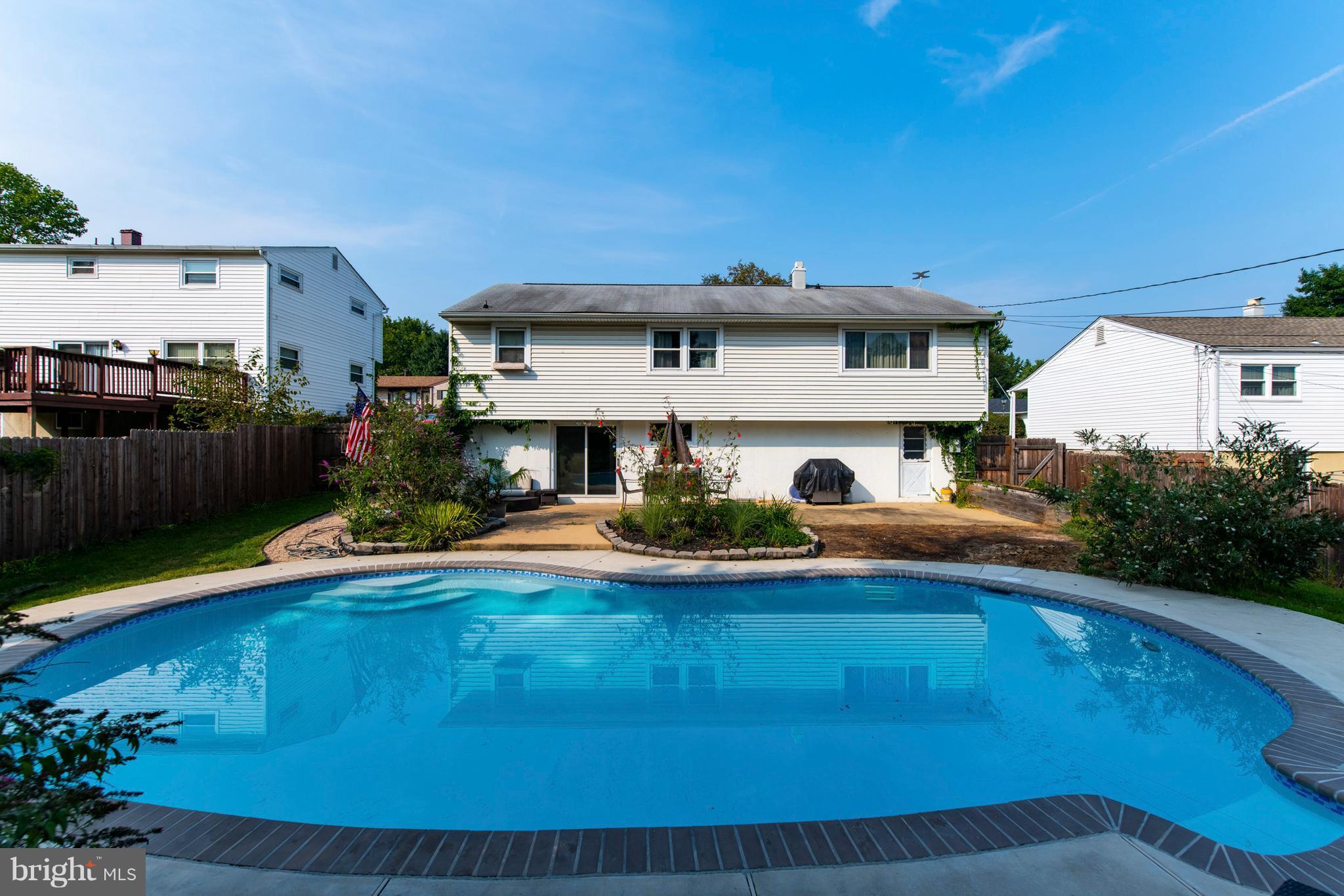 1519 National Road Baltimore, MD 21237 - Photo 25 of 30 a front view of a house with swimming pool