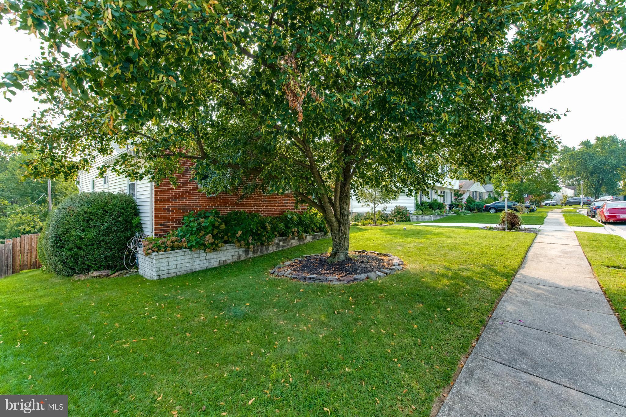 1519 National Road Baltimore, MD 21237 - Photo 30 of 30 a view of a garden with a fountain