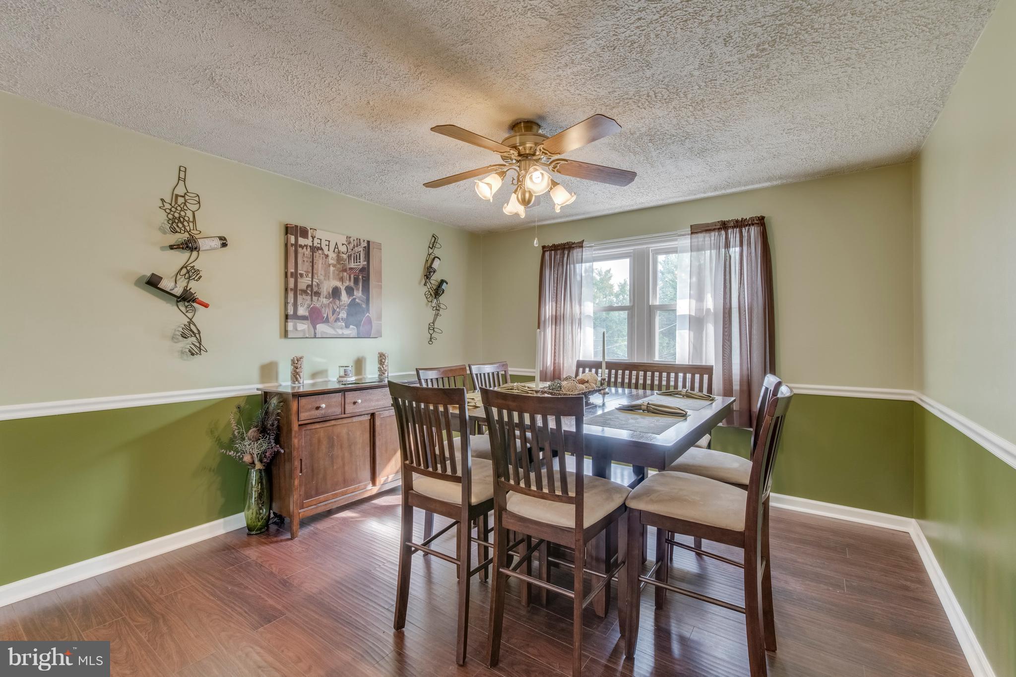 1519 National Road Baltimore, MD 21237 - Photo 5 of 30 a view of a dining room with furniture window and wooden floor