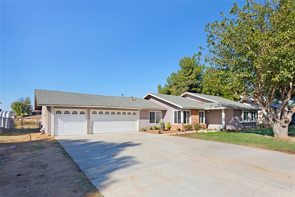 9463 Stirrup Street Riverside, CA 92509 - Photo 1 of 1 Curb appeal, 3 car garage, lots of driveway space and space at either side of the house too