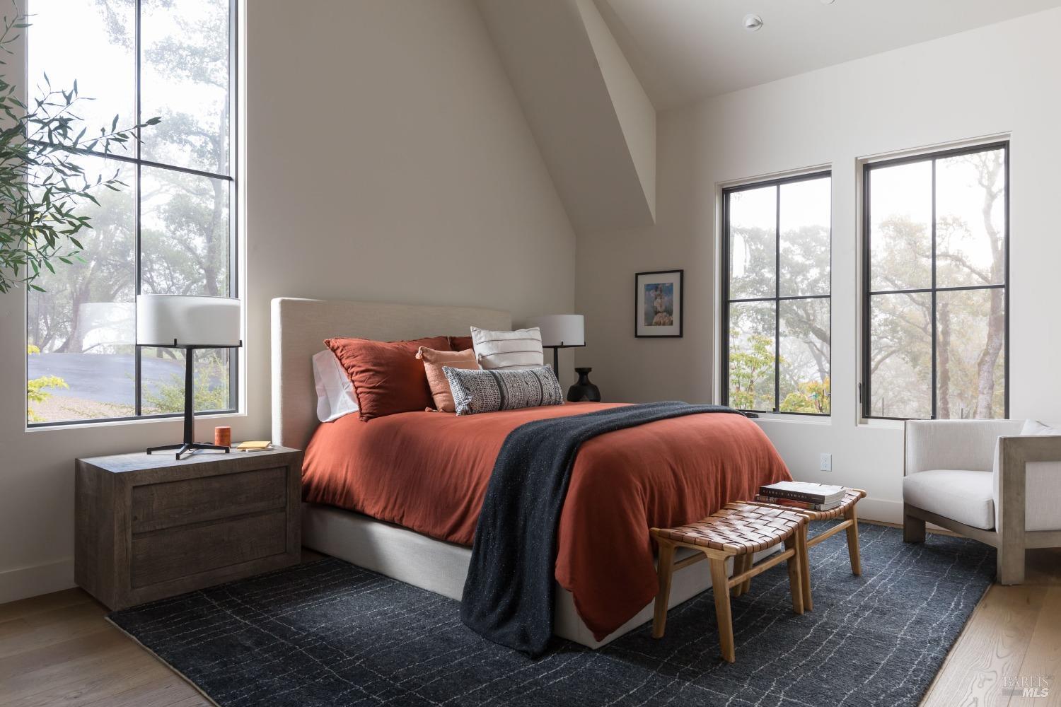 1970 Warm Springs Road Glen Ellen, CA 95442 - Photo 17 of 41 a bed room with a bed and a chair
