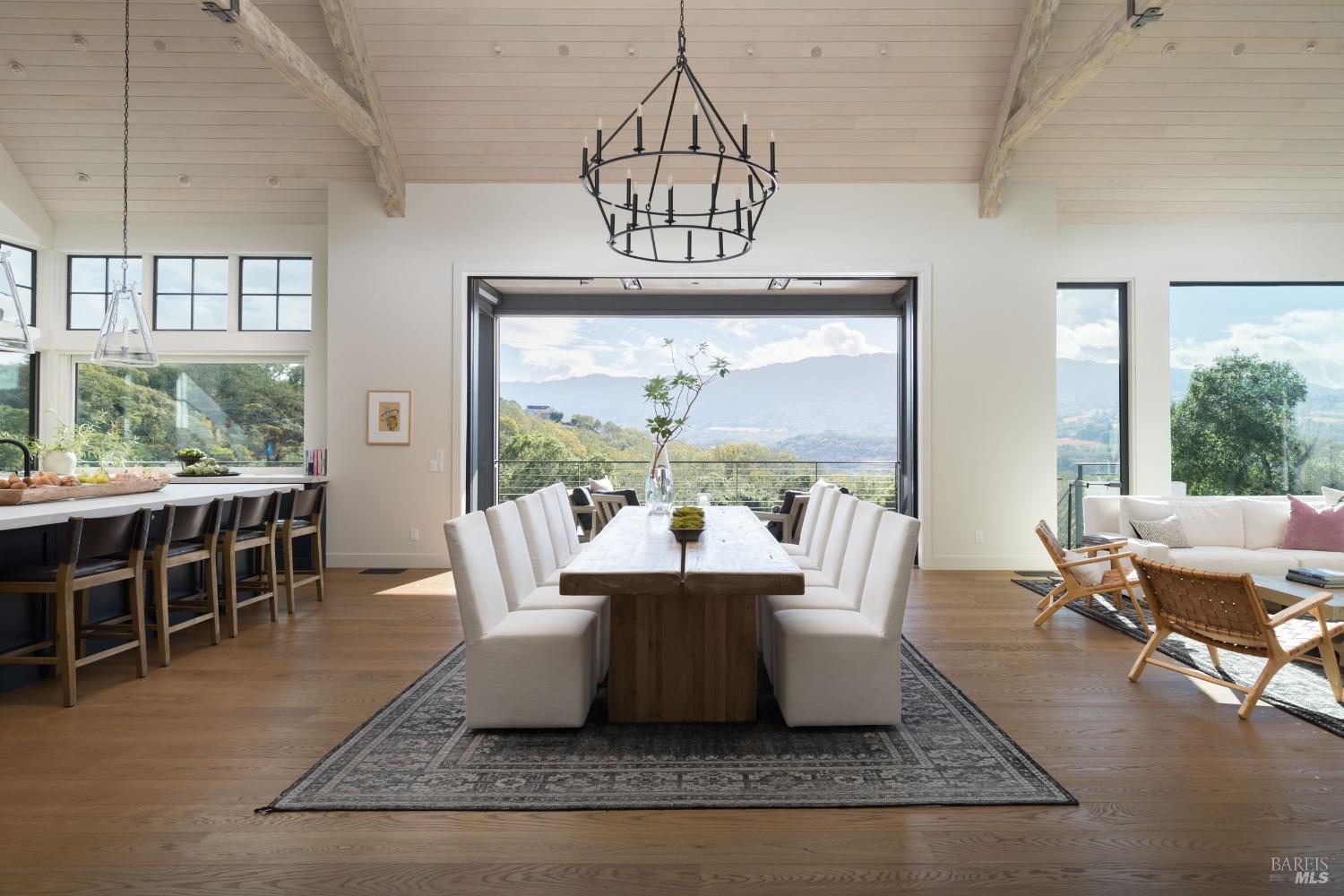 1970 Warm Springs Road Glen Ellen, CA 95442 - Photo 7 of 41 a view of a dining room with furniture wooden floor and a chandelier