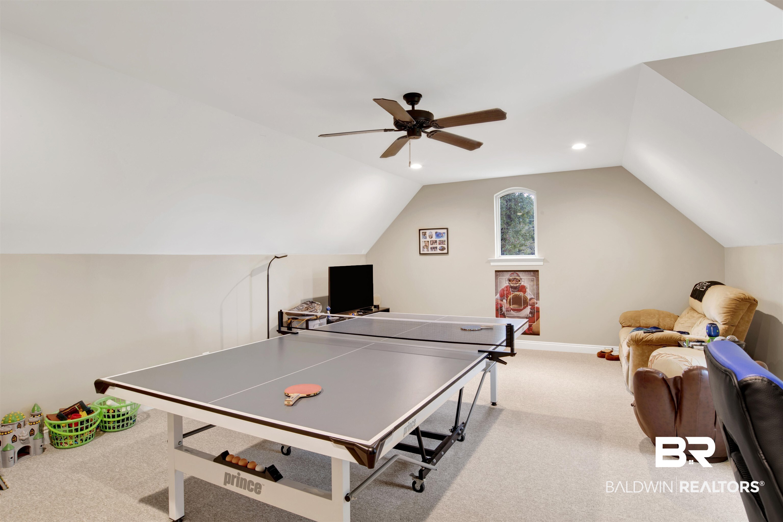 2440 Johnson Road West Mobile, AL 36695 - Photo 33 of 40 Recreation room featuring ceiling fan, light colored carpet, and lofted ceiling