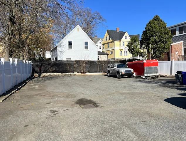 a view of a house with a small yard
