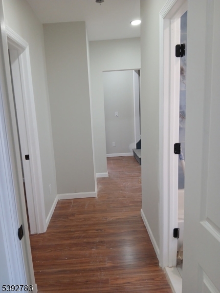 14 Ruth Street Irvington, NJ 07111 - Photo 12 of 15 a view of hallway with wooden floor
