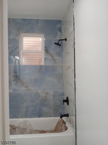 14 Ruth Street Irvington, NJ 07111 - Photo 3 of 15 a bathroom with a shower